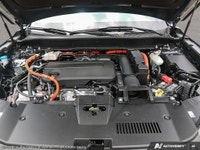 The 2026 Honda CR-V Hybrid EX-L AWD in a striking Blue finish offers both power and precision with i... (image 5)