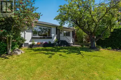 Located in Victoria’s sought-after Vic West neighbourhood, this updated 1949 bungalow blends timeles...