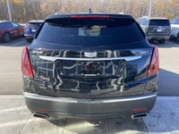 The 2024 Cadillac XT5 Standard AWD, finished in Stellar Black Metallic, combines refined styling, ad... (image 7)
