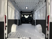 Meet the 2025 Ram ProMaster Cargo Van Tradesman 3500 High Roof Ext 159 WB w/Pass Seat, dressed in a... (image 9)