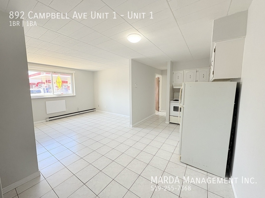 COZY 1 BED/1 BATH MAIN FLOOR -CLOSE TO U OF W + HYDRO! 4