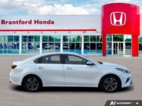 The 2024 Kia Forte EX, finished in striking Snow White Pearl, instantly elevates your daily commute... (image 6)