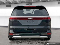 This *2023 Kia Carnival LX* blends minivan practicality with SUV-inspired styling. Powered by a smoo... (image 3)