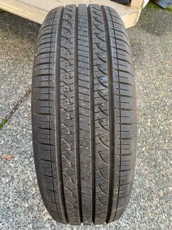 a nice all season yokohama tire in excellent cond almost like new DOT 2023 (1 TIRE ONLY) size 225/60...