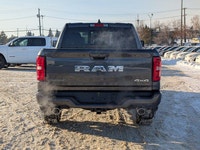 The 2026 Ram 1500 Big Horn Crew Cab in Granite Crystal Metallic combines rugged capability with refi... (image 4)