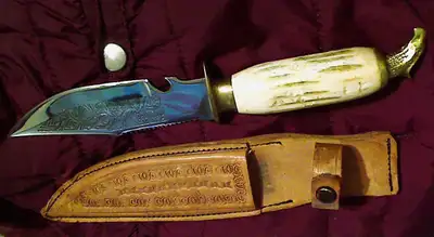 knife with leather sheeve $10.00 519 749 8998