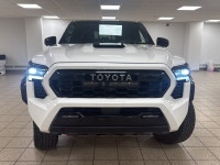 The latest 2025 Toyota Tacoma Hybrid brings meaningful refinement to Toyotas midsize pickup formula,... (image 7)