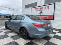 A reliable midsize sedan with a comfortable interior, smooth performance, and practical convenience... (image 5)