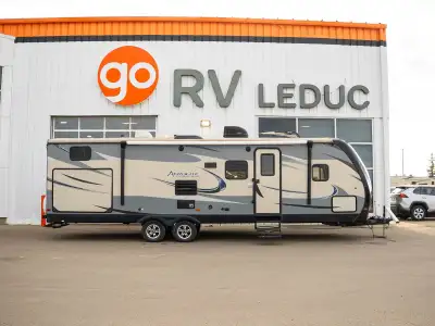 A family-friendly RV with a roomy layout, comfortable living space, and convenient features for camp...