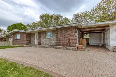 COME VIEW THIS NEWLY LISTED, 1850 SQ. FT. SPRAWLING BUNGALOW WITH GRADE-LEVEL ENTRY INTO SPACIOUS FO...