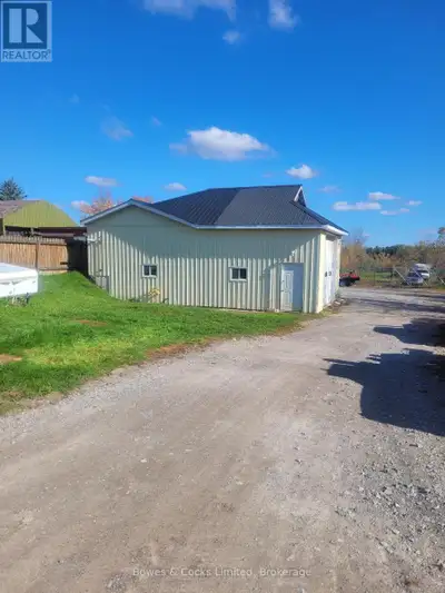 1200 square foot double bay shop with 50 ft x 100 ft fenced storage impound. Legal impound for polic...