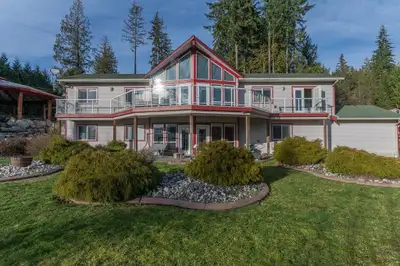 Nestled on a fully fenced 4.45-acre lot, this custom-built rancher w/ basement offers the perfect bl...