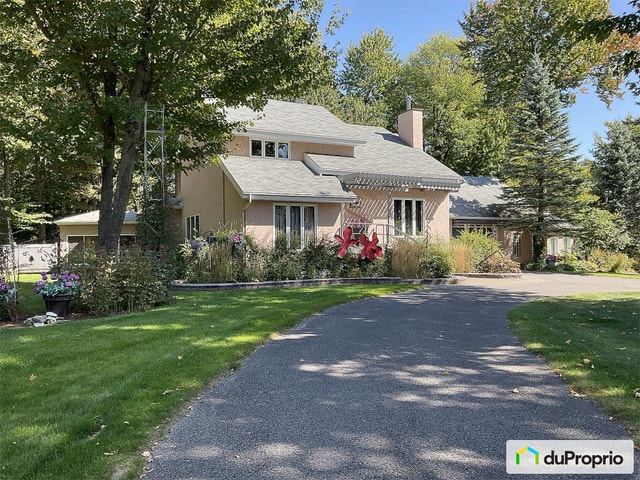 $699,000 - 2 Storey for sale in St-Charles-Borromée — photo 1