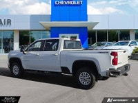 2500 4WD Crew Cab – Summit White with Jet Black interior, deep tint rear glass, power door locks, re... (image 3)