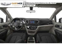 The 2026 Chrysler Grand Caravan SXT in a captivating black hue is the front-wheel drive van designed... (image 4)