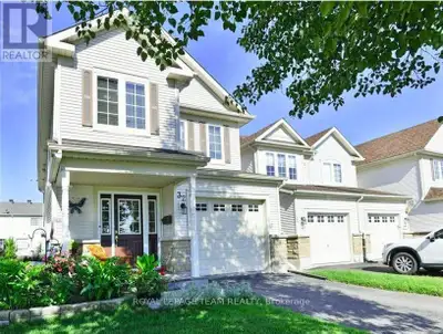 Experience warmth and charm in this stunning executive end-unit townhome located in the desirable St...