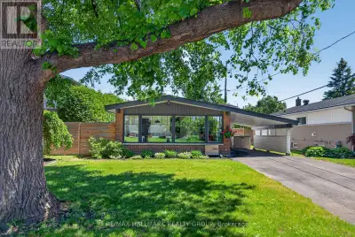 Step into 2006 Michigan Ave and feel it immediately, that timeless mid-century modern character mixe...