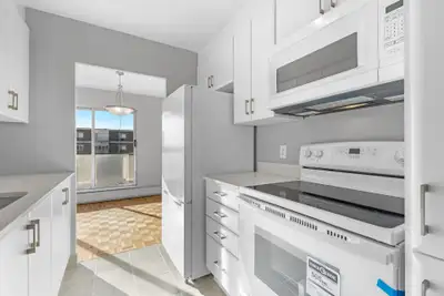 Renovated 3 Bedroom, 1.5 Bath corner suite featuring a spacious living room & formal dining area! Bu...