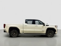 Experience the perfect blend of rugged capability and modern sophistication with the 2021 GMC Sierra... (image 1)
