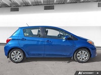 Experience efficient and reliable driving with this 2013 Toyota Yaris. Finished in eye-catching Blaz... (image 5)
