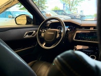 The 2019 Land Rover Range Rover Velar P300 R-Dynamic SE is a striking luxury SUV that blends avant-g... (image 9)