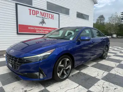A stylish compact sedan with a modern interior, advanced technology, and efficient performance, offe...