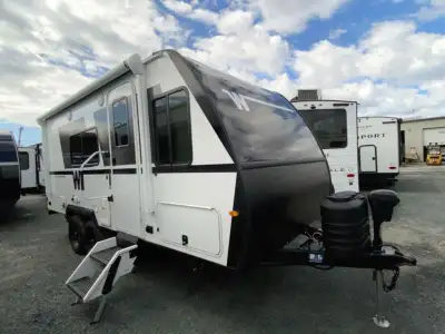 Winnebago Micro Minnie travel trailer 2100BH highlights: Booth Dinette Slide Full-Size Bed Bunk Beds...