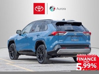 The 2024 Toyota RAV4 Hybrid XSE AWD, dressed in a stunning blue, offers an exceptional all-wheel dri... (image 5)