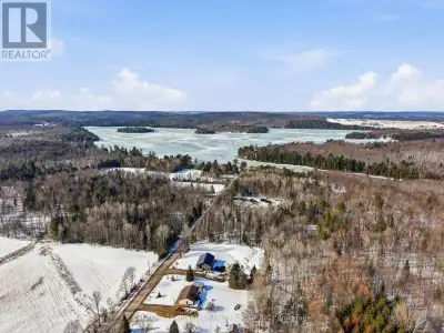 Welcome to 36 Fraser Lake Road-a modern country home offering just steps from the lake on a beautifu...