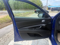 A stylish compact sedan with a modern interior, advanced technology, and efficient performance, offe... (image 6)