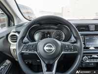 Navigate cityscapes with confidence in this sophisticated former daily rental 2024 Nissan Versa SV.... (image 9)