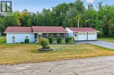 0.9-Acre Lot // Attached Double Heated Garage // 3 Bedrooms // 5-Piece Bathroom // Open-Concept Livi...