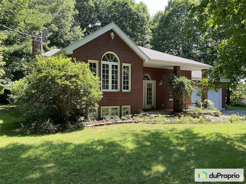 $749,500 - Bungalow for sale in St-Ambroise-De-Kildare — photo 1