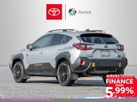 The 2024 Subaru Crosstrek Wilderness AWD in a striking silver finish with an automatic AWD transmiss... (image 6)