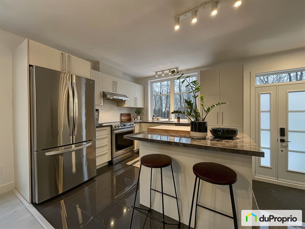 $440,000 - Semi-detached in Charlesbourg (ND-Des-Laurentides) — photo 2