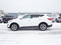 This 2014 Hyundai Santa Fe Sport Limited is powered by a responsive 2.0L turbocharged four-cylinder... (image 4)