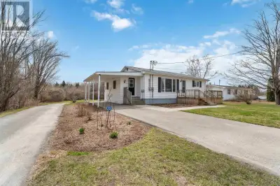 Stop paying rent!! You could own this house and live in the spacious main floor unit while paying ju...