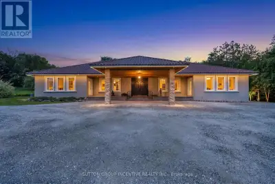 WOW! CUSTOM BUILT SHOWPIECE WITH OVER 6110 SQUARE FEET FINISHED ON 19 ACRES! THIS THOUGHTFULLY DESIG...