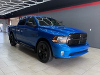 The 2021 Ram 1500 Classic Express 4x4 Crew Cab in a striking Blue finish is a true powerhouse with i... (image 4)