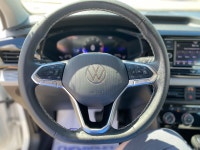 Experience confident city driving and weekend adventures in the 2024 Volkswagen Taos Trendline, a tu... (image 3)