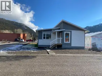 Walk one block to library, pharmacy, post office, and downtown Blairmore. This brand new home has be...