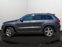 This Jeep Grand Cherokee has a dependable Regular Unleaded V-8 5.7 L/345 engine powering this Automa... (image 1)