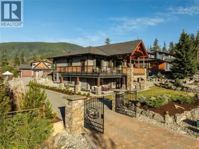 Imagine waking up to the gentle lapping of Cowichan Lake from this architecturally designed West Coa...