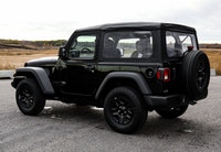 This Jeep Wrangler has a dependable Intercooled Turbo Premium Unleaded I-4 2.0 L/122 engine powering... (image 1)