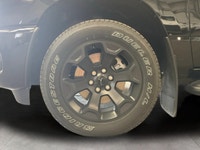 The 2026 Ram 1500 Express 4x4 Crew Cab 57 Box is a powerful yet stylish black truck thats ready for... (image 8)