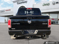 Discover the ultimate blend of luxury and capability with this striking 2014 Ram 1500 Limited, boast... (image 4)