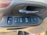 A spacious family minivan with comfortable seating, convenient features, and versatile cargo space,... (image 7)