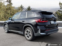Command attention and experience agile driving in the 2025 BMW X1 xDrive28i. This dynamic Sport Util... (image 2)