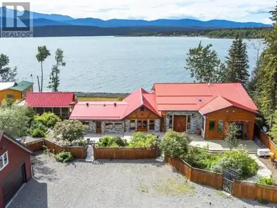 Introducing a luxurious waterfront property nestled on 0.7 acres, just 25 minutes from Whitehorse. T...