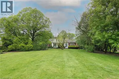The search is over! This absolutely stunning 2600+ sqft bungaloft offers rare multi-generational ver...